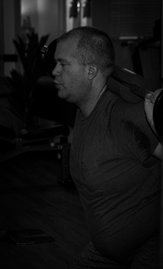 Man weight lifting at Turbo Personal Training Studio